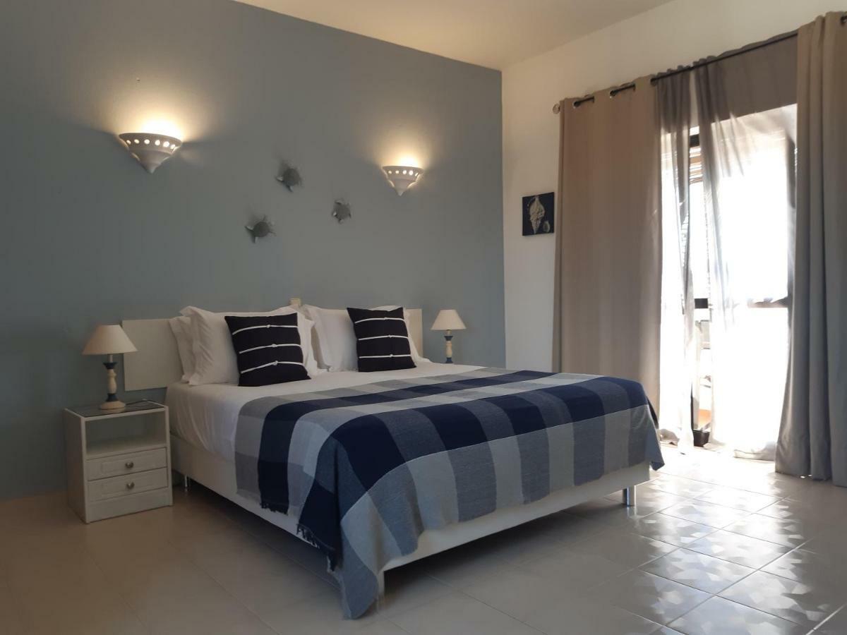 Casa Rosa Montes Hotel Praia Da Luz ภายนอก รูปภาพ